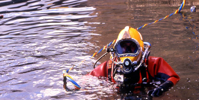 Diver using a contaminated water diving system