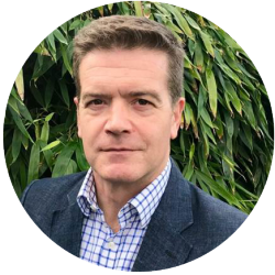Justin Hains MBE.png